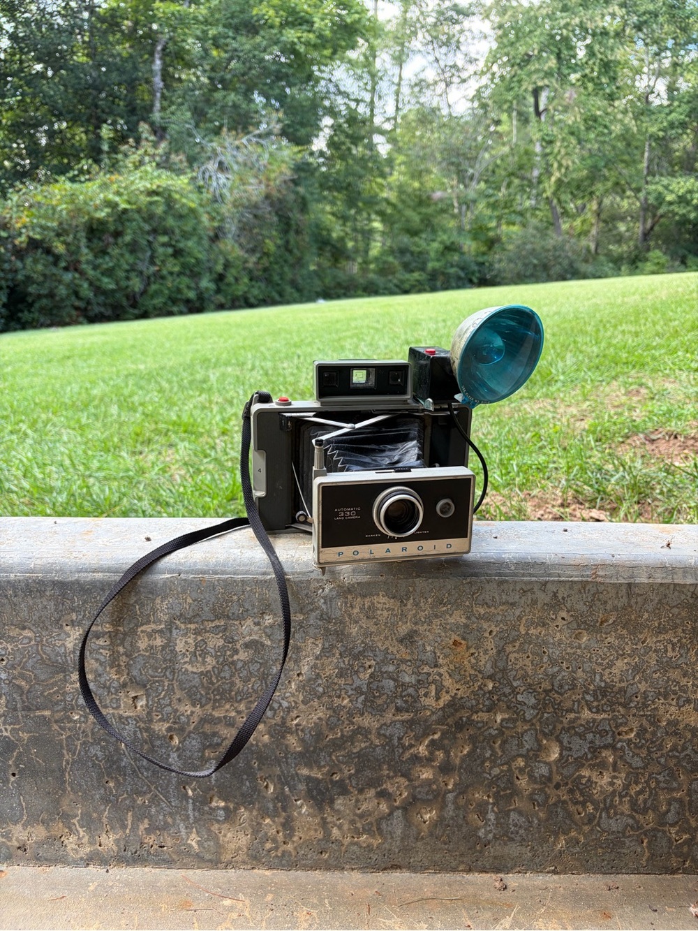 Vintage Polaroid Land Camera Model 330 in Black with Blue Flash Dome